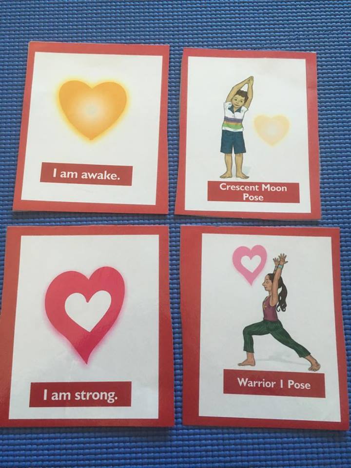 4 of the LOVE Yoga Cards for Kids printed on red paper | Kids Yoga Stories